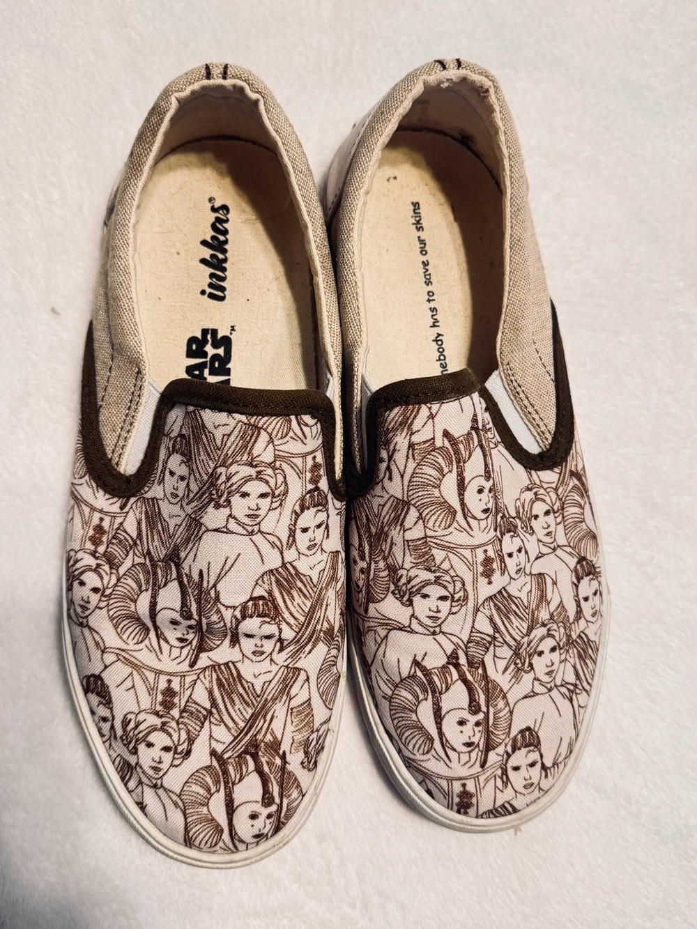 inkkas Beige Canvas Slip-On Loafers with Brown Character Print